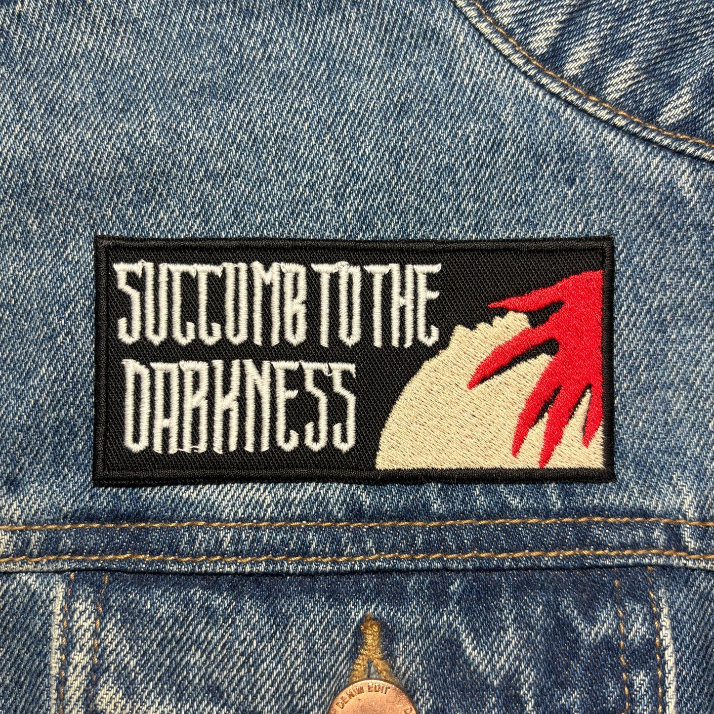 Succumb To The Darkness