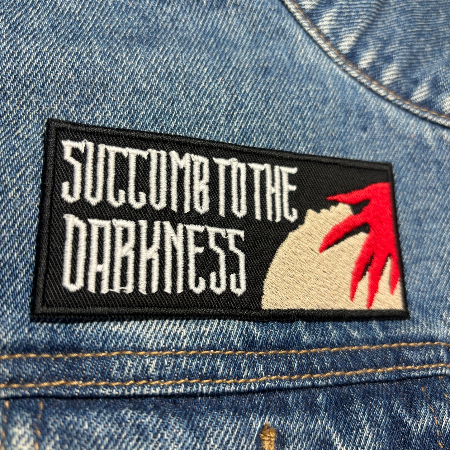 Succumb To The Darkness