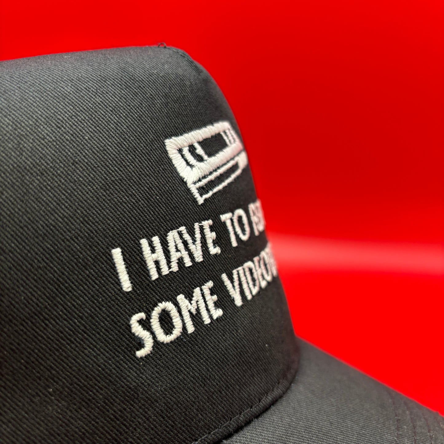 Return Videotapes Trucker Cap